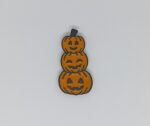Uśmiechnięte dynie halloweenowe Magnes