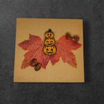Uśmiechnięte dynie halloweenowe Magnes