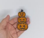Uśmiechnięte dynie halloweenowe Magnes